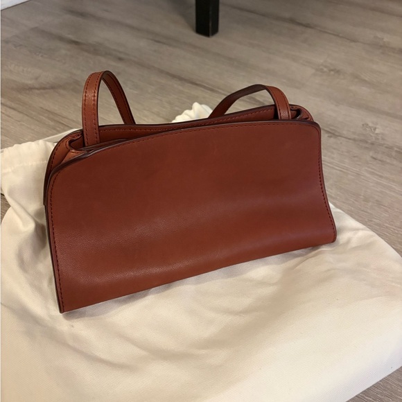 The Row Handbags - NWT The Row Peggy bag in color New Burgundy